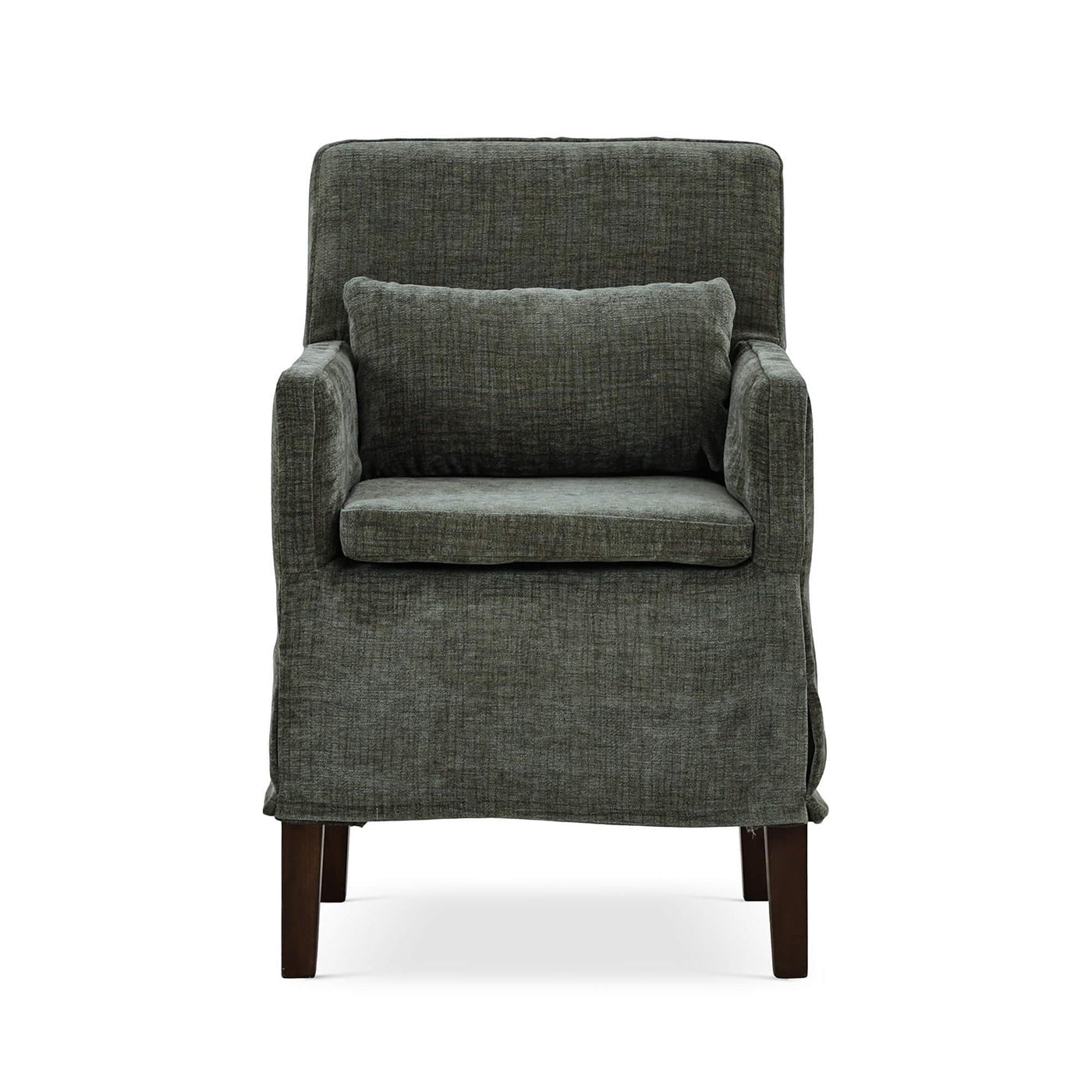 Green slipcovered dining armchair, front view with pillow.