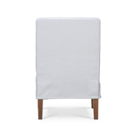 Back view of white slipcovered dining chair.