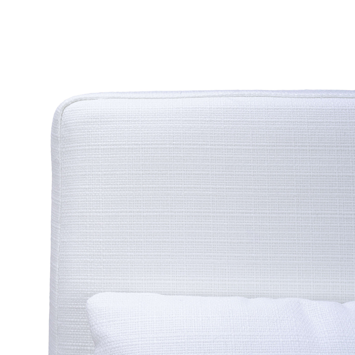 Close-up of white slipcovered chair fabric texture.