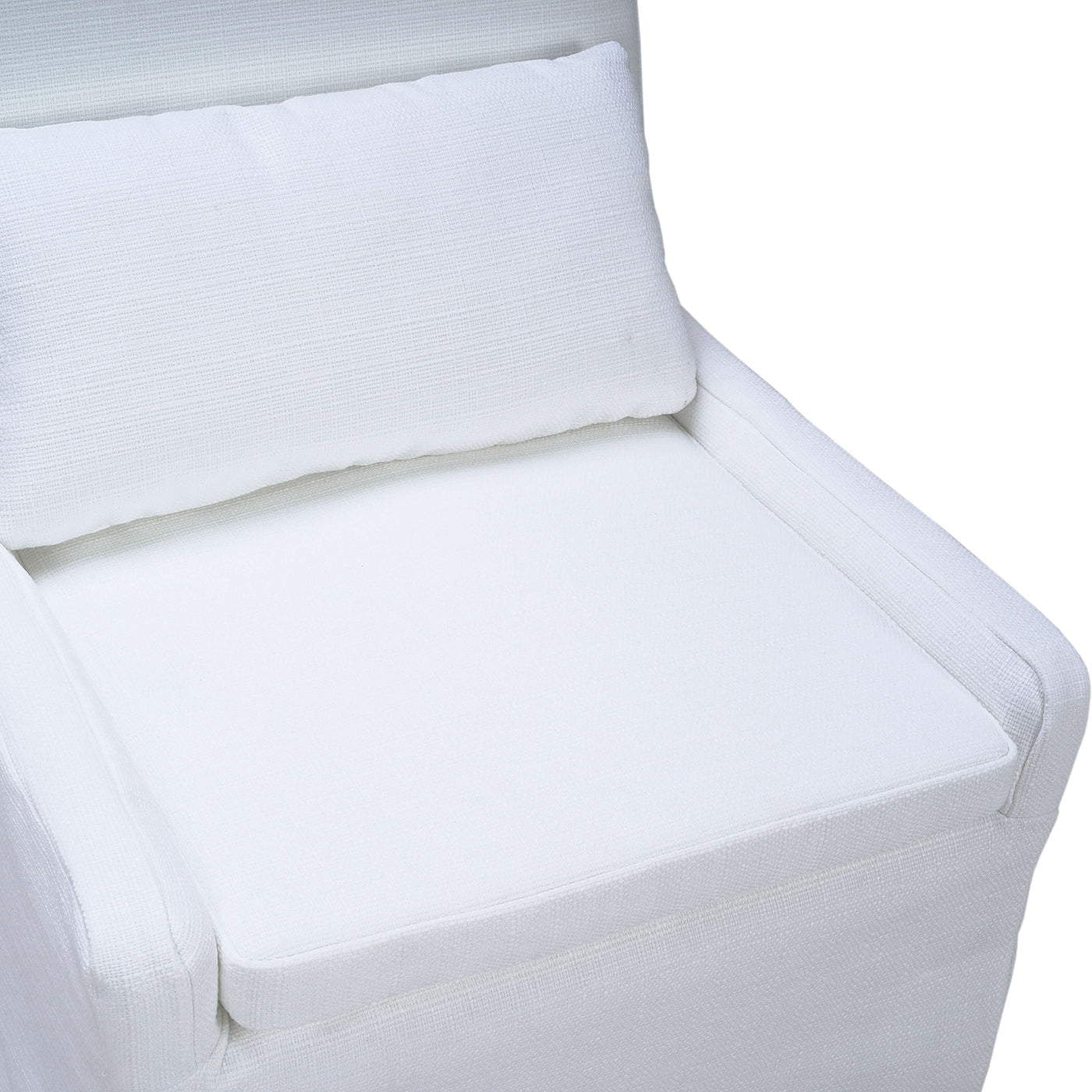Cushion and seat of slipcovered dining chair detail.