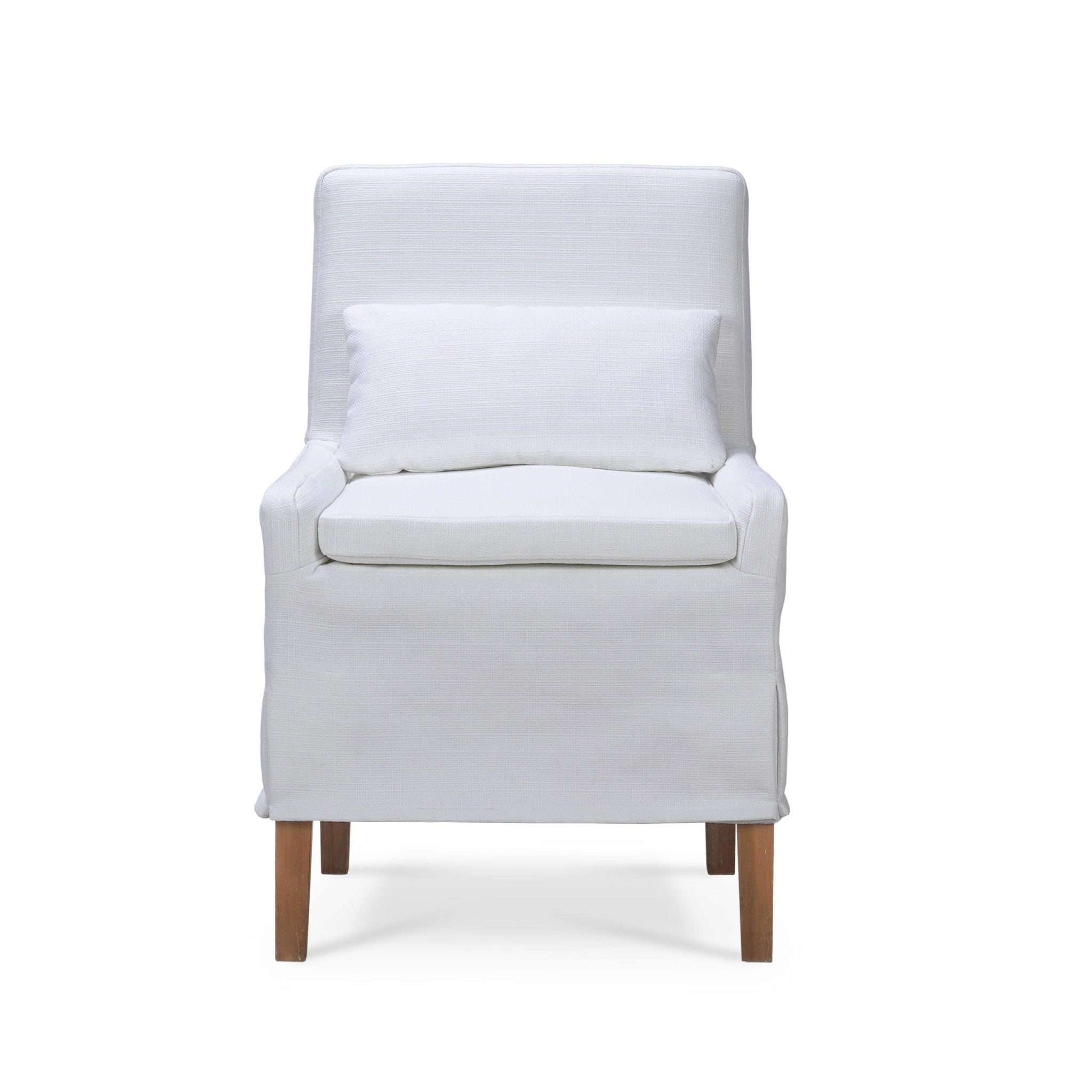 Slipcovered dining chair with cushion, front view.