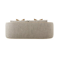 Back view of textured chenille sofa with cushions.