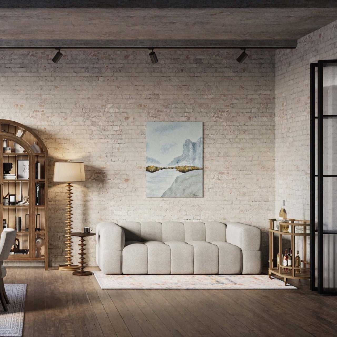Bar cart in living room with sofa and art.