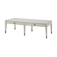 Coastal style cocktail table angled view, drawers visible.