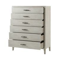 Coastal style chest with drawers partially open, side view.