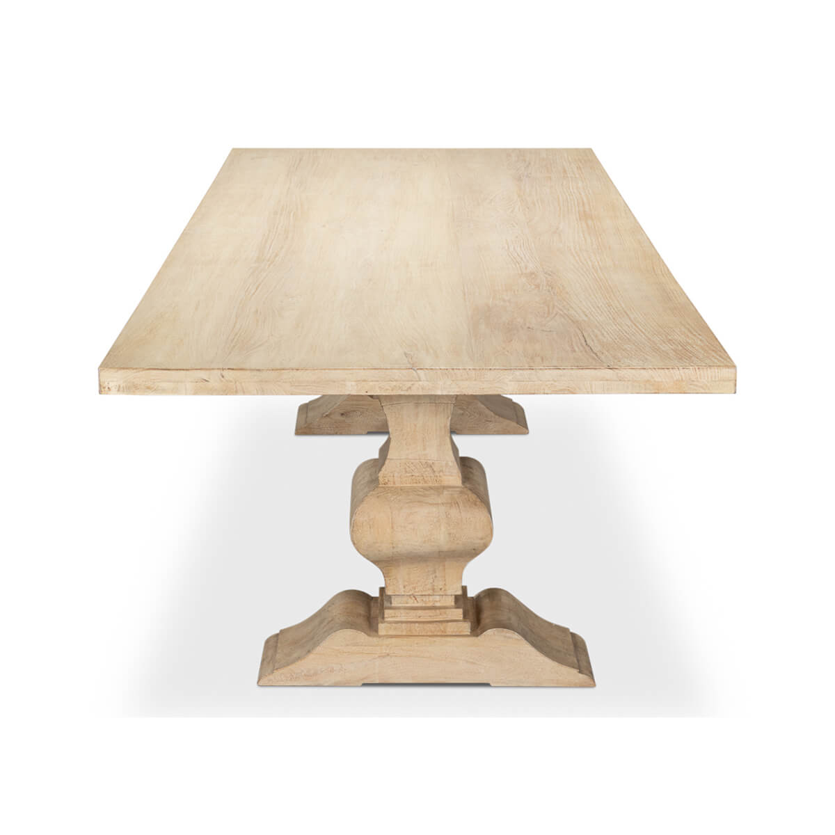 Dining table length view showing symmetrical pedestal legs.