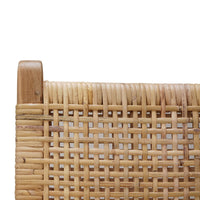 Close-up of woven backrest on teak barstool.