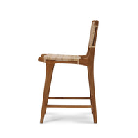 Teak counter stool, side view, natural wood finish.