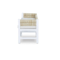 White bench with cushion, side profile.