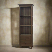Wooden bookcase with rustic brown finish, textured wall backdrop.