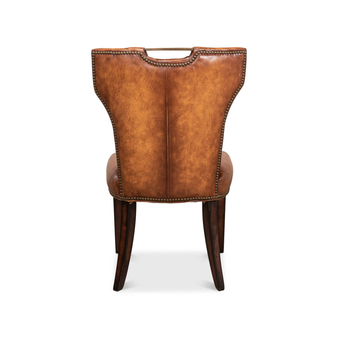Cognac leather dining chair rear view, backrest detail.