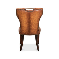 Cognac leather dining chair rear view, backrest detail.