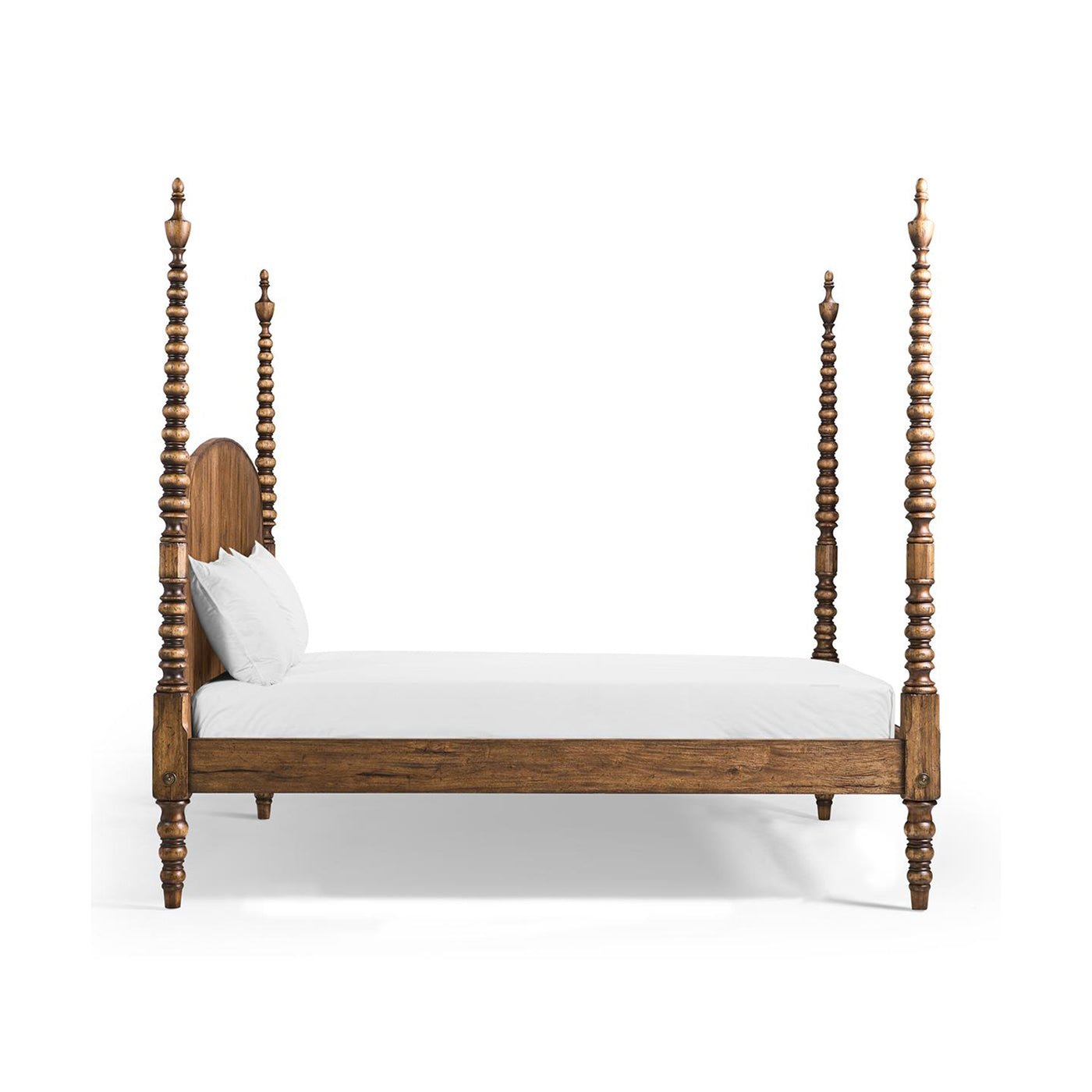 Side view of four-poster bed, mattress and pillows.