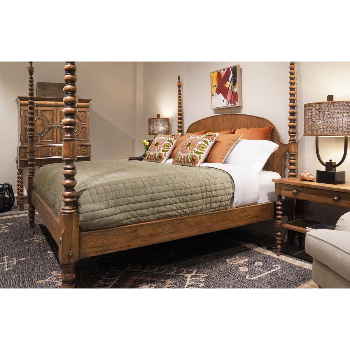 Colonial four-poster bed in cozy, decorated bedroom setting.