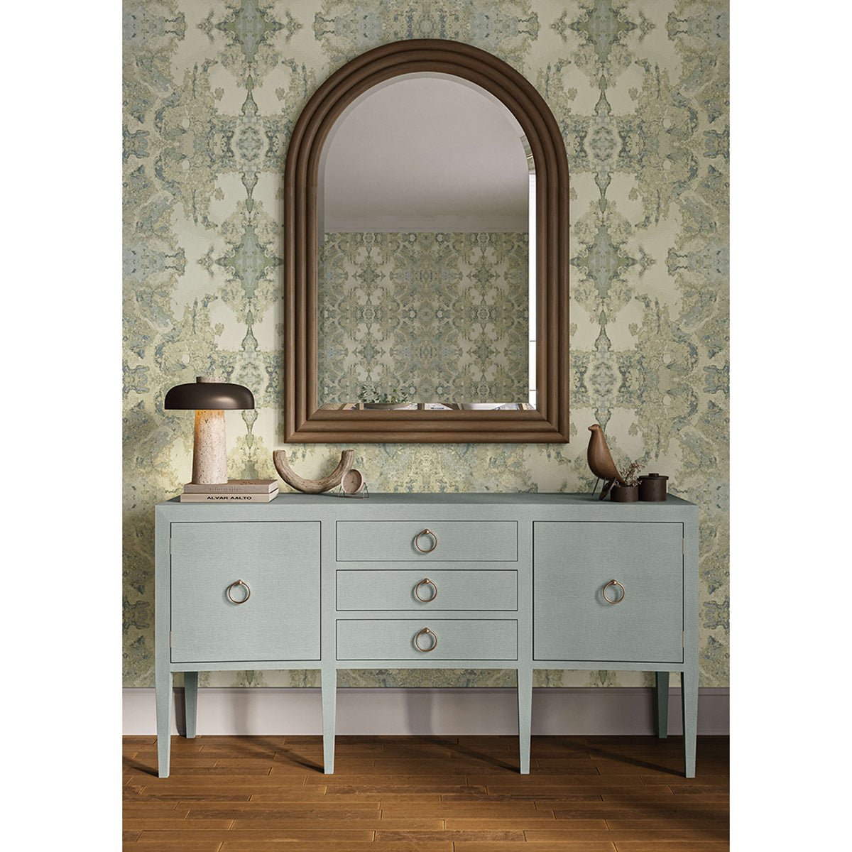 Styled blue linen sideboard in decorated room setting.