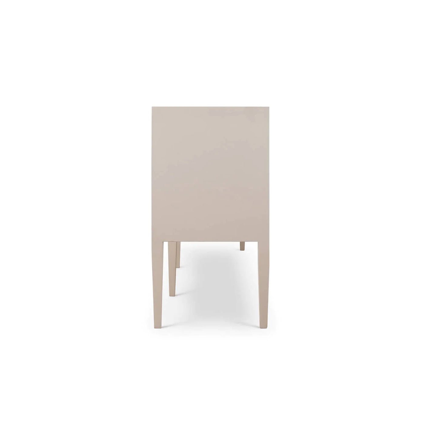 Side view of cream linen sideboard, sleek design, legs visible.