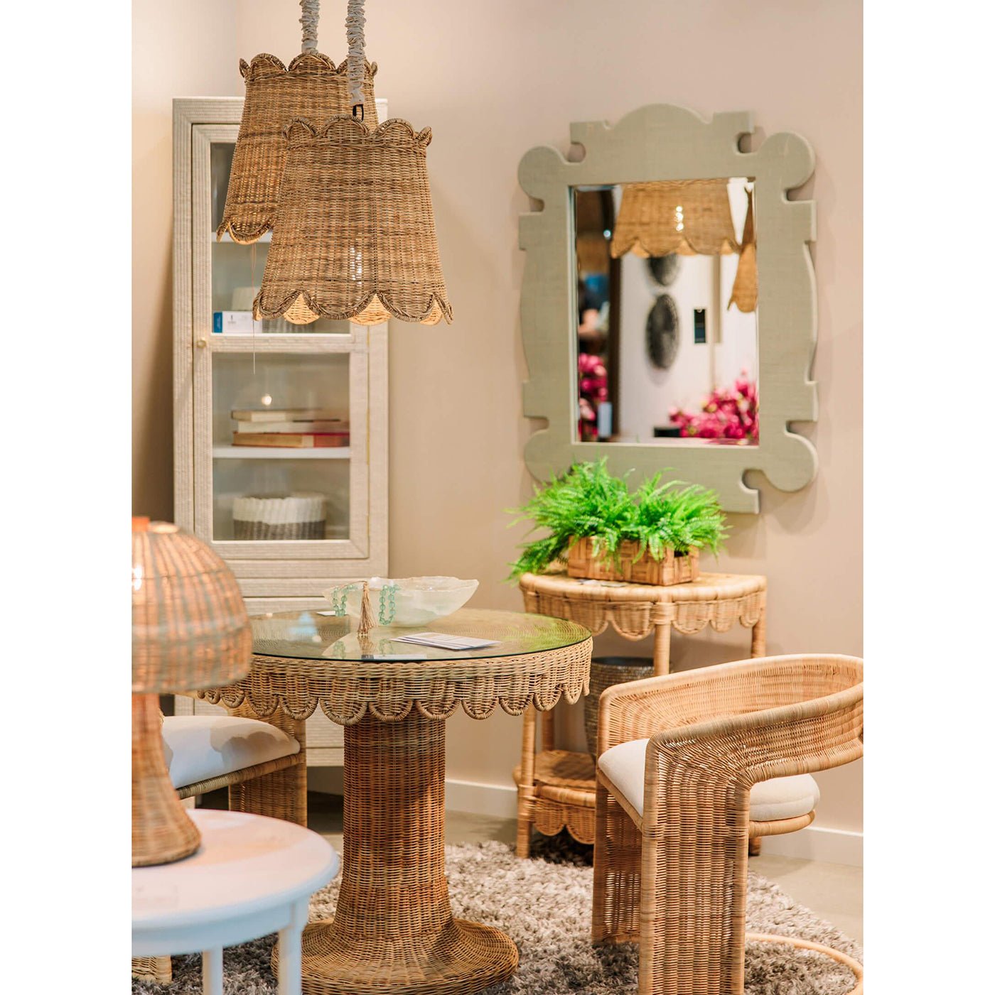 Rattan barrel dining chairs in styled room setting.