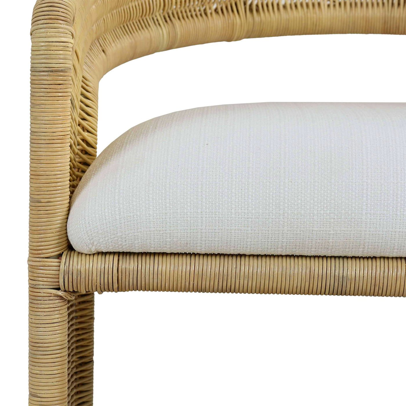 Rattan barrel dining chair close-up of seat cushion.