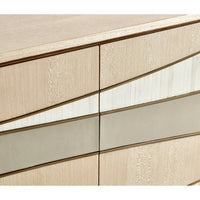 Close-up wave pattern on contemporary coastal sideboard doors.