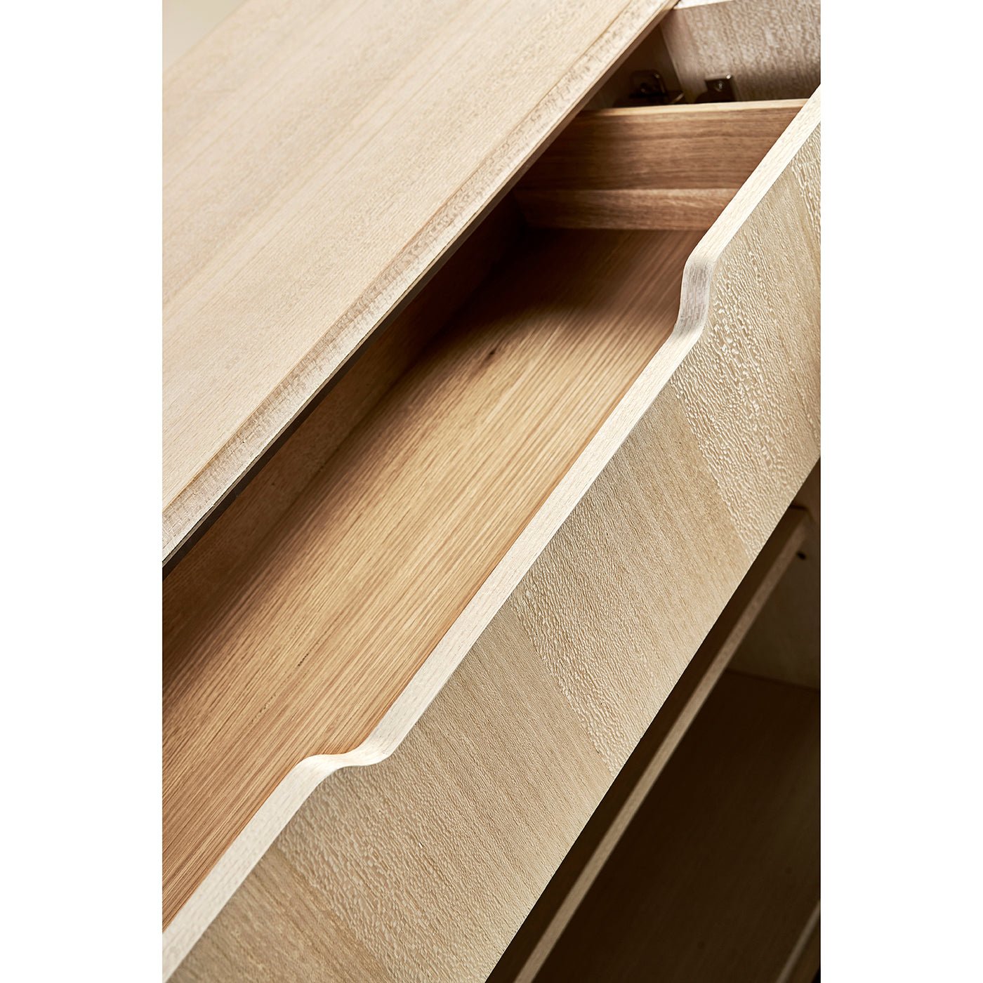 Interior drawer view of contemporary coastal sideboard.