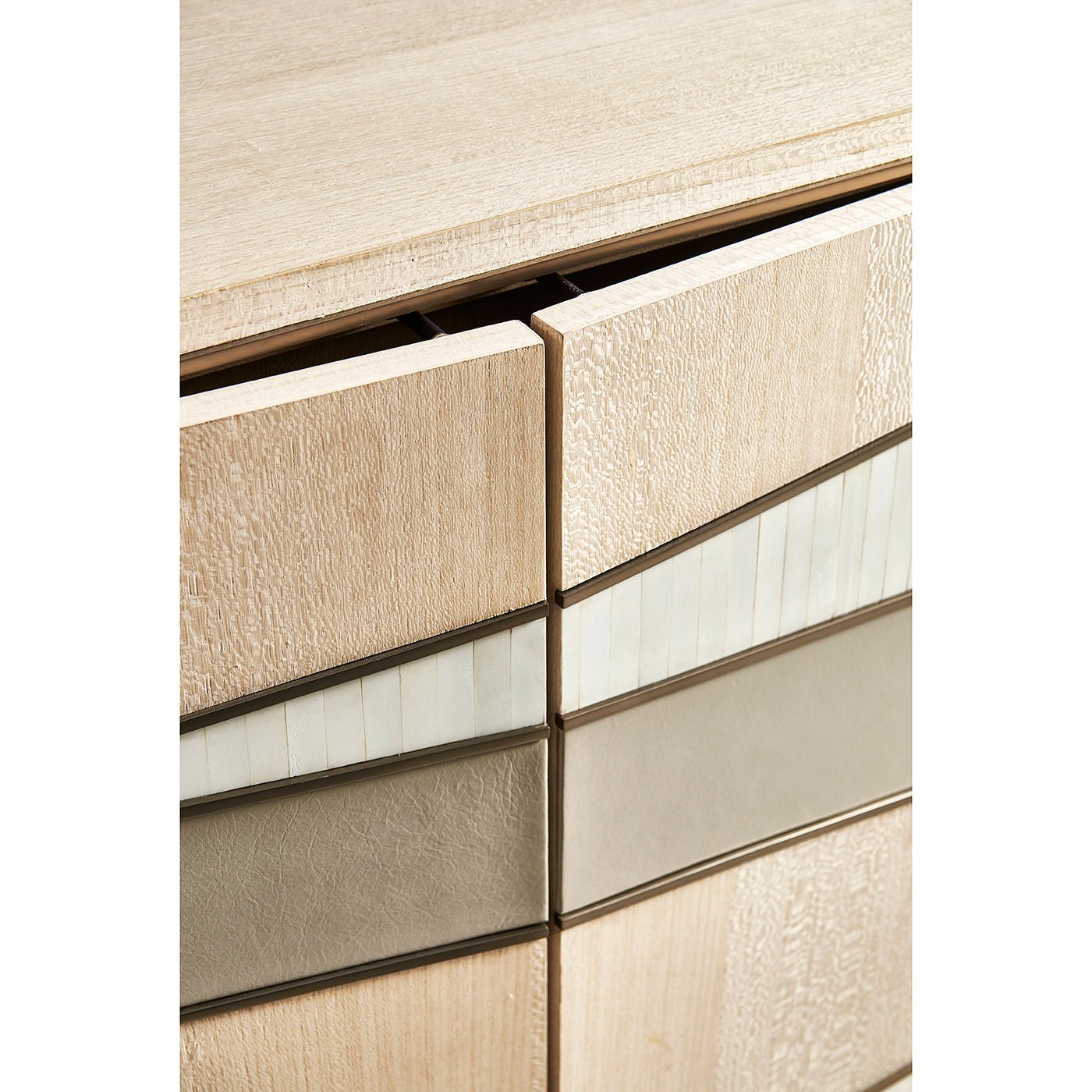 Detailed look at contemporary coastal sideboard door textures.