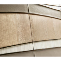 Texture detail on contemporary coastal sideboard door close-up.
