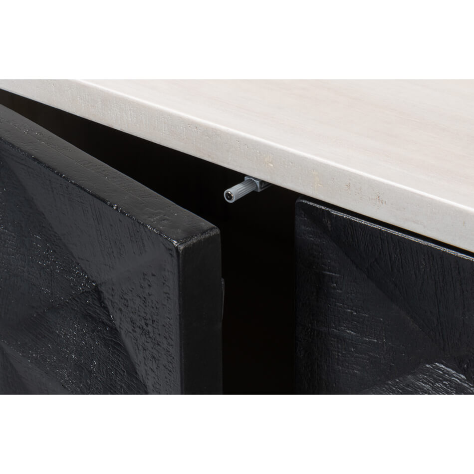 Detail of hinge mechanism on sideboard door