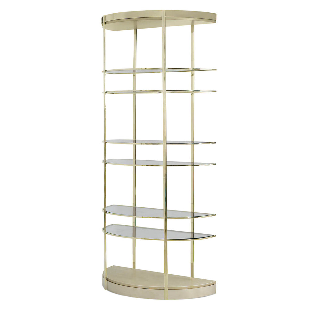 Brass half-moon etagere with glass shelves.