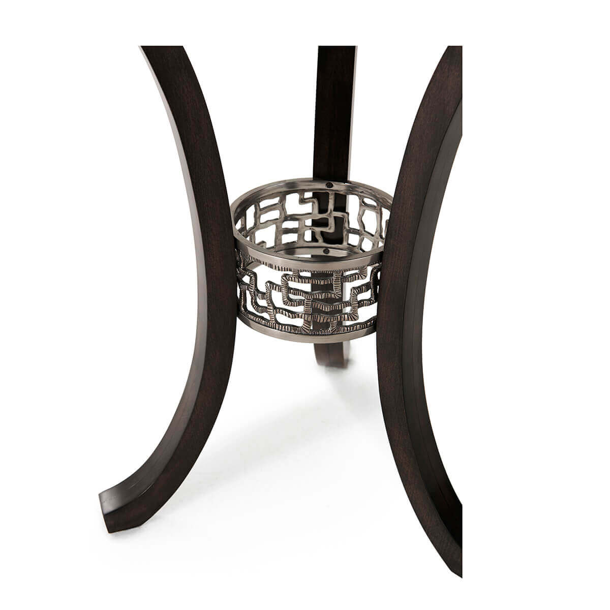 Close-up of metal detail on round accent table base.