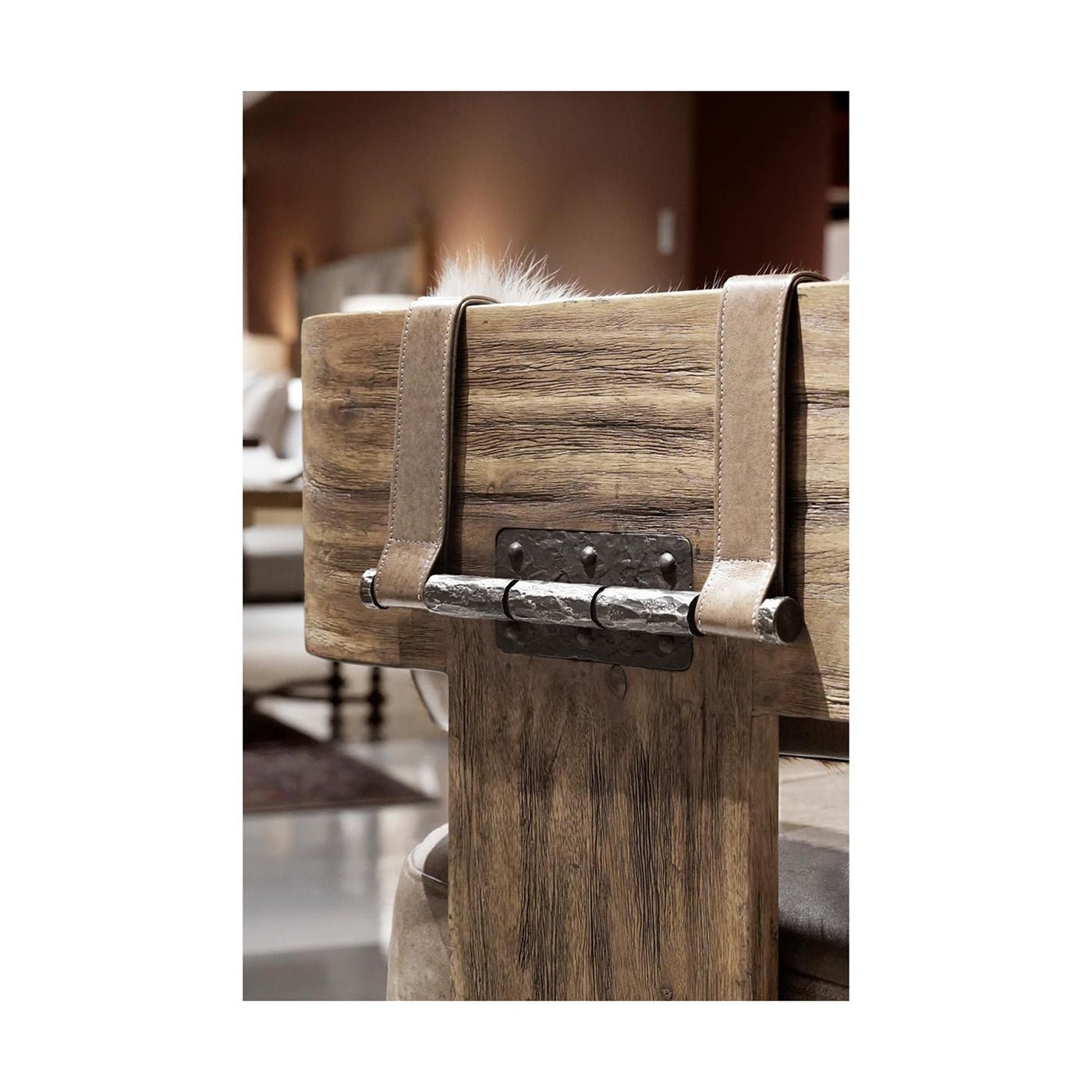Back detail of armchair showing metal hardware.