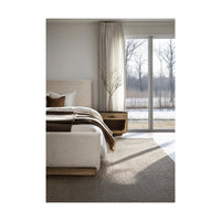 Bedroom with contemporary CAL King bed and natural light.