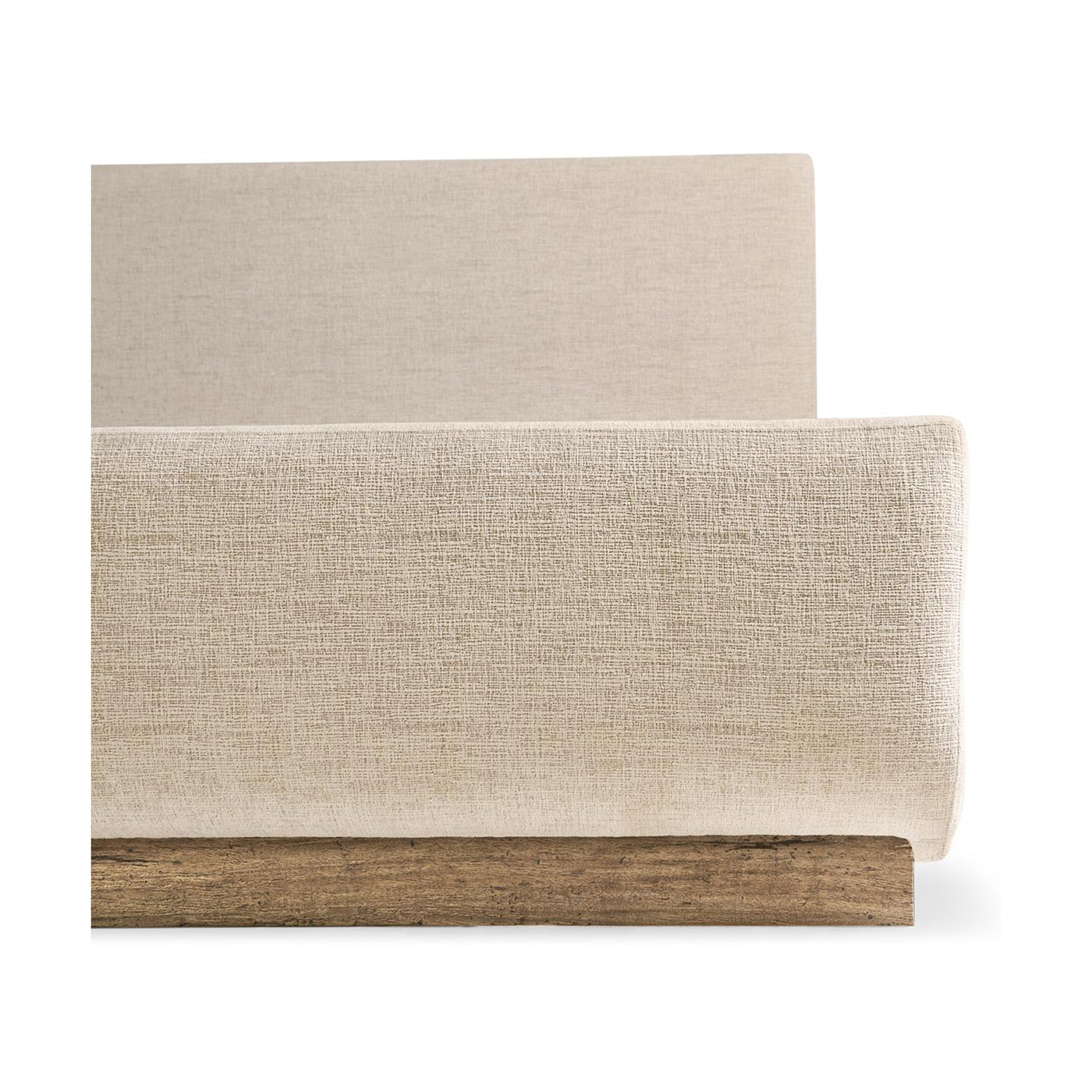Close-up of upholstered bed corner, fabric texture.