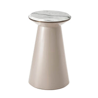 Modern tan accent table with marble top, angled view.