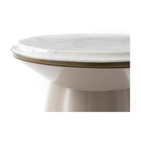 Close-up of marble-top accent table, design detail.