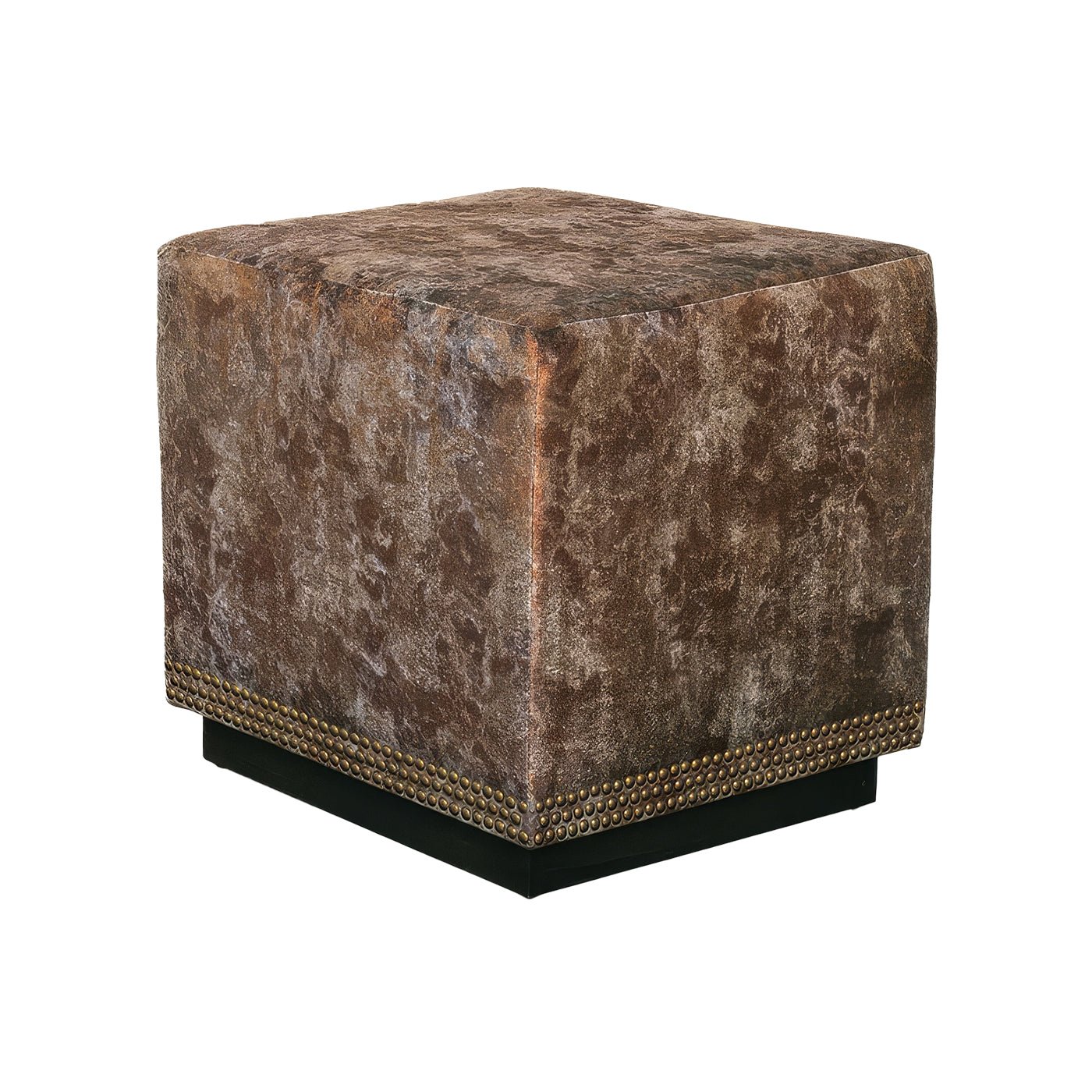 Copper velvet cube ottoman against a white wall.