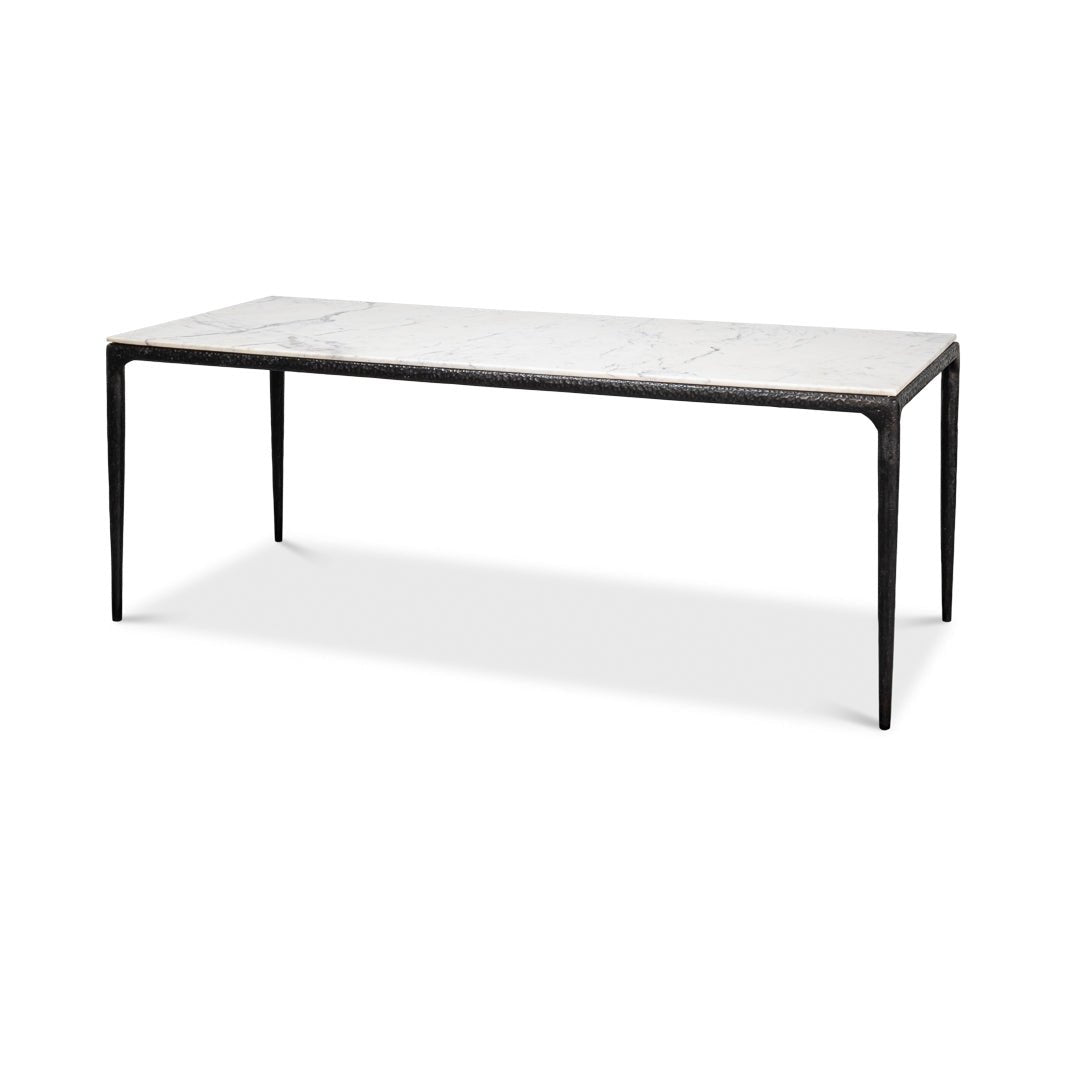 Marble dining table, angled view, black legs visible.