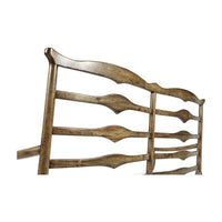 Close-up of ladder back detail on country bench.