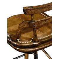 Side view of bar stool arm and seat, wood finish.
