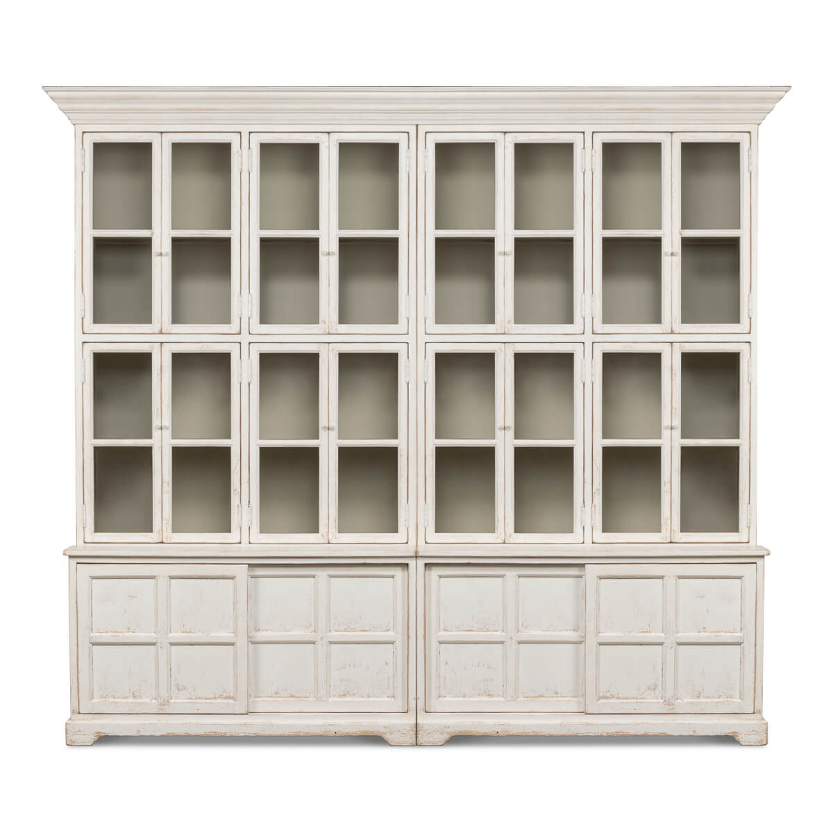 Front view of glass-doored white bookcase.