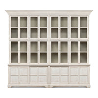Front view of glass-doored white bookcase.