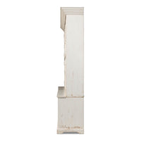 Side profile of tall white bookcase.