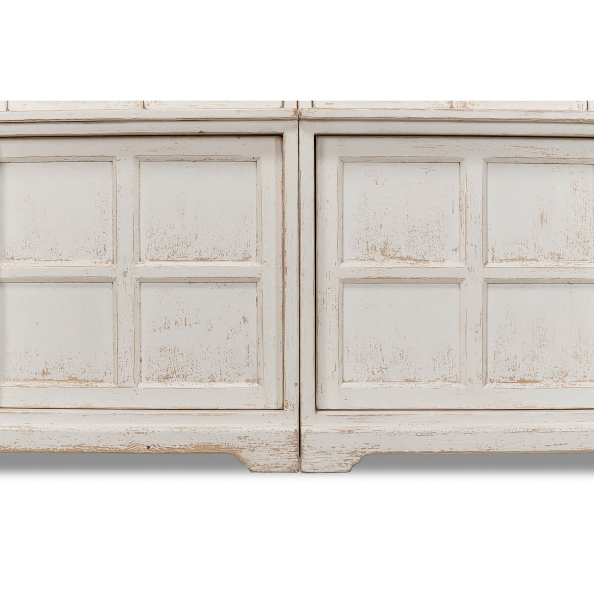 Close-up of bookcase lower panel details.