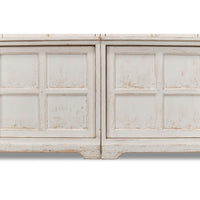 Close-up of bookcase lower panel details.