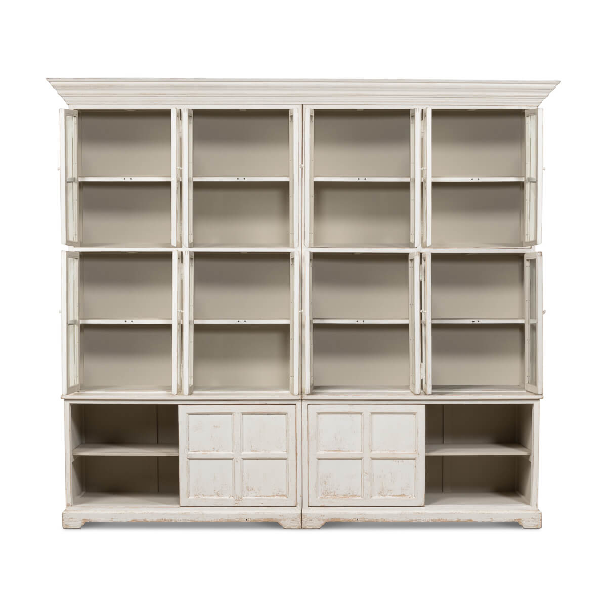 White bookcase with open lower doors front view.