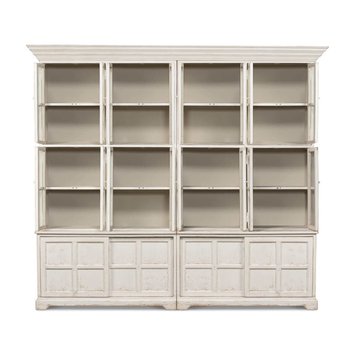White bookcase with open glass doors front view.