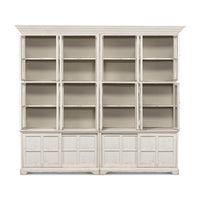 White bookcase with open glass doors front view.