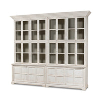 White bookcase with glass doors angled view.