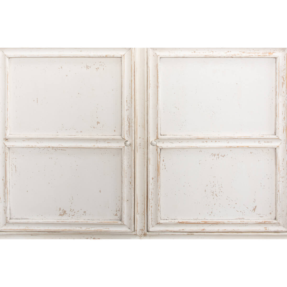 Close-up display cabinet, panel detail, distressed white wood.