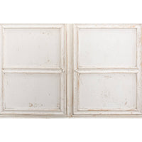 Close-up display cabinet, panel detail, distressed white wood.