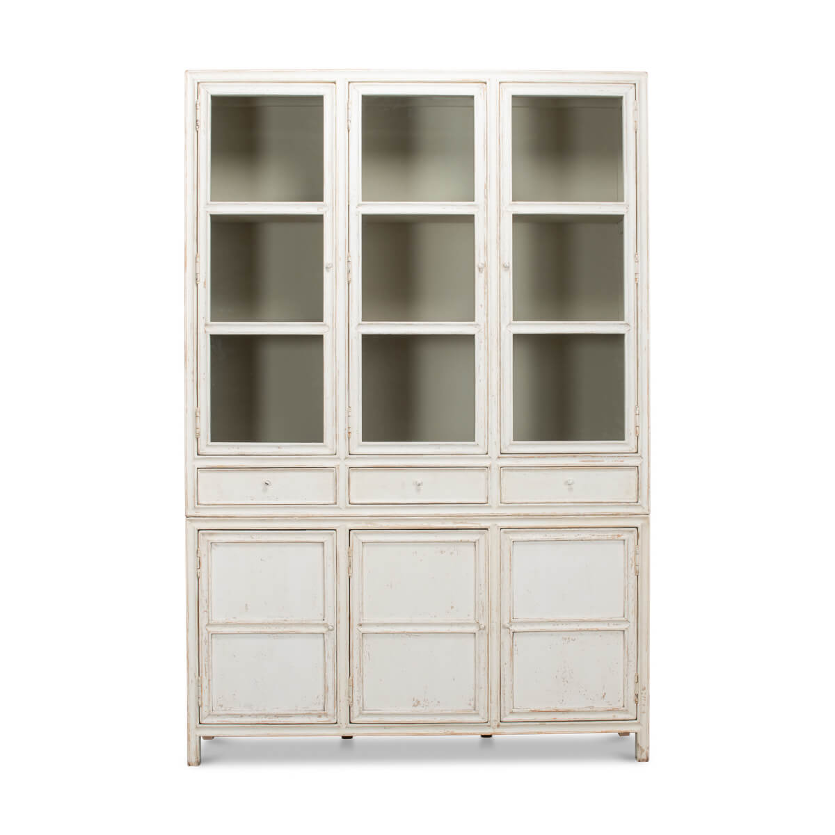 White display cabinet front view, glass doors, three sections.